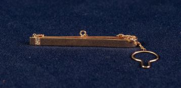 9ct GOLD GENTLEMANS'S TIE CLIP SET WITH TWO TINY DIAMONDS, hallmarked London 1989, 7.7 gms