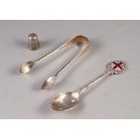 VICTORIAN ENGRAVED SILVER PAIR OF SUGAR TONGS, London 1887, together with a SILVER THIMBLE and an