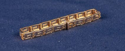 14ct GOLD BRACELET with Greek key pierced panel links, 10.6gms