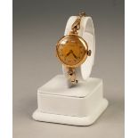 LADY'S 'DOMINANT' SWISS WRIST WATCH, with 9ct gold circular case, 18 jewels movement, Arabic dial,