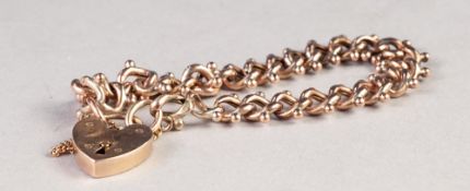 9ct GOLD BRACELET, curb pattern hollow links, having beaded borders and the padlock clasp, 9.5gms