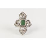 WHITE GOLD COLOURED METAL RING (unmarked) with centre collet set oblong emerald, the surround of