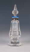 GEORGE V GUILLOCHE ENAMELLED AND SILVER MOUNTED ENGRAVED GLASS PERFUME BOTTLE, of square, pedestal