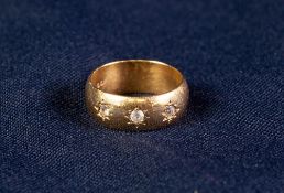 18ct GOLD RING SET WITH THREE TINY WHITE STONES, 8 gms gross