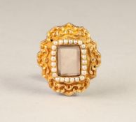 VICTORIAN GOLD SHAPED OVAL BROOCH, the front repousse rococo scrolls on a matte background centred