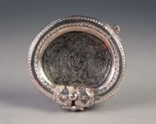 UNMARKED FOREIGN SILVER COLOURED METAL ASHTRAY, with hinged bangle pattern border and engraved