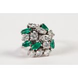 18ct WHITE GOLD, DIAMOND AND EMERALD COCKTAIL RING, set with six round brilliant cut diamonds,