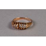 18ct GOLD RING WITH A LOZENGE SHAPED SETTING OF THREE TINY DIAMONDS AND ONE WHITE STONE, the
