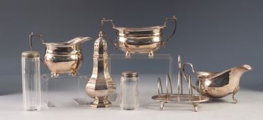 INTER-WAR YEARS ELECTROPLATED TWO HANDLED SUGAR BASIN AND MATCHING CREAM JUG, a plated SUGAR CASTOR,