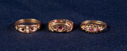 18ct GOLD RING SET WITH TWO TINY DIAMONDS AND THREE TINY RUBIES, another GOLD COLOURED METAL RING, a