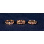 18ct GOLD RING SET WITH TWO TINY DIAMONDS AND THREE TINY RUBIES, another GOLD COLOURED METAL RING, a