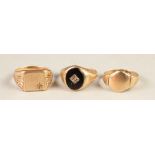 GENTS 9ct GOLD SIGNET RING, the oval black onyx top gypsy set with a tiny diamond, 9ct gold SIGNET