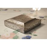 PROBABLY IRANIAN SILVER COLOURED METAL SQUARE BOX, THE HINGED LID HAVING CAVETTO BORDERS, THE