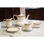PARAGON 'ATHENA' PATTERN WHITE CHINA TEA SERVICE WITH PRINTED AND GILT AND BLUE BANDED BORDERS,