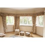 TWO PAIRS OF CREAM AND FLORAL PRINTED COTTON CURTAINS, lined, 7' drop; one pair 44' wide and one 14'