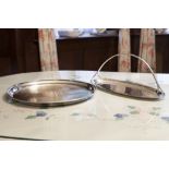 AN ELECTROPLATE ENGINE TURNED CIRCULAR SALVER, 15" DIAMETER, AN ELECTROPLATE OVAL SERVING TRAY