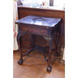 A CARVED MAHOGANY CARD TABLE WITH ENVELOPE FOLDING TOP, ONE DRAWER, ON CABRIOLE LEGS WITH CLAW AND