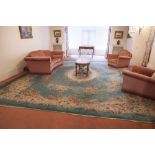 A LARGE WASHED CHINESE CARPET TO MATCH THE ABOVE, 16' X 14'