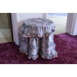 A PAIR OF MAHOGANY OCCASIONAL TABLES WITH CIRCULAR BEATEN COPPER TOPS EACH ON COLUMN AND QUARTETTE