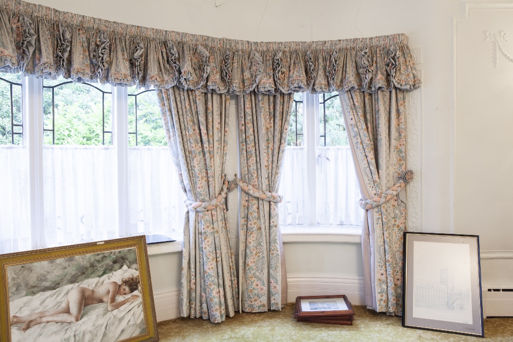 SIX PAIRS OF PRINTED COTTON CURTAINS with naturalistic floral design in pastel colours, on a pale