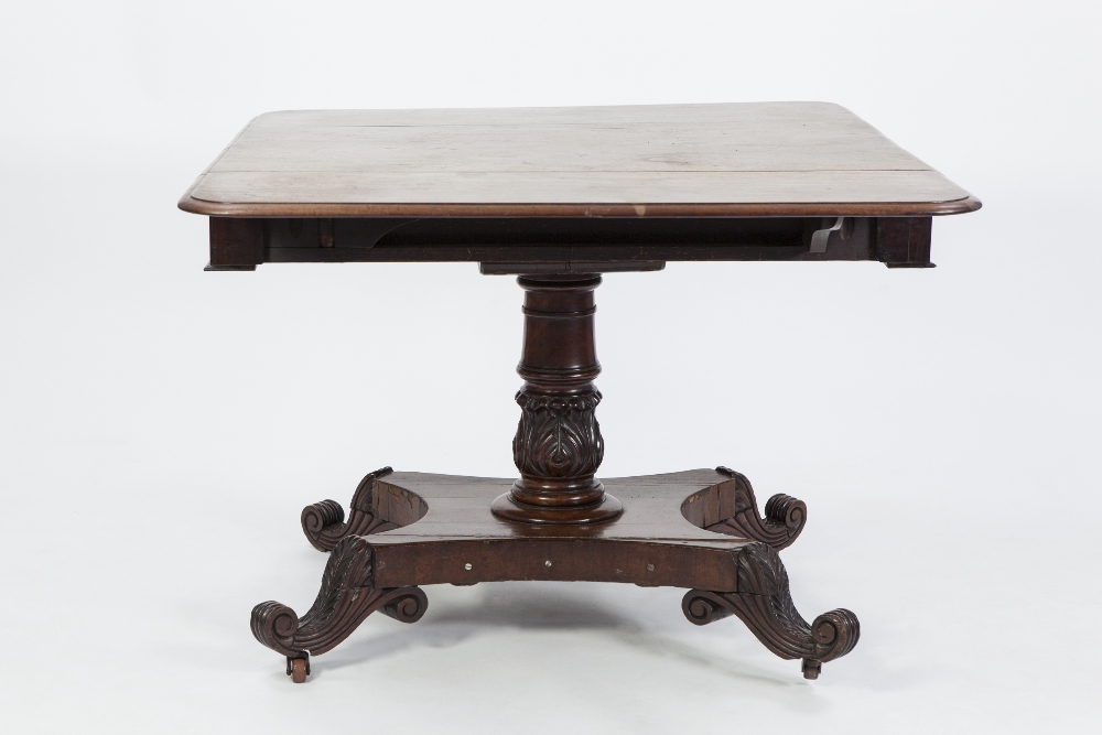 EARLY NINETEENTH CENTURY MAHOGANY PEDESTAL PEMBROKE TABLE, the rounded oblong drop leaf top above - Image 2 of 2
