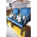 A PAIR OF ANTIQUE MAHOGANY LIBRARY OPEN ARMCHAIRS, WITH BACKS, ELBOW REST AND SEATS COVERED IN