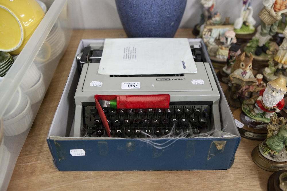 AN OLIVETTI TYPEWRITER IN CASE