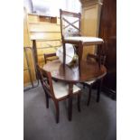 A SET OF FOUR REGENCY STYLE MAHOGANY SINGLE CHAIRS, ON SABRE FRONT SUPPORTS AND THE MAHOGANY