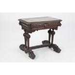 VICTORIAN CARVED OAK WRITING TABLE IN THE RENAISSANCE STYLE, the canted oblong top above a gadrooned