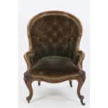 VICTORIAN CARVED WALNUT TUB SHAPED EASY ARMCHAIR, the moulded show-wood frame enclosing a buttoned