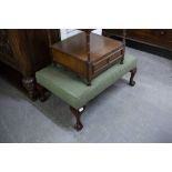 A REPRODUCTION LONG LOW STOOL, with brushed silk button top raised on cabriole legs and ball and