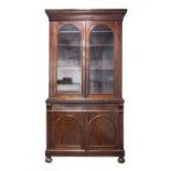 VICTORIAN MAHOGANY LIBRARY BOOKCASE, the moulded cornice above a pair of cupboard doors, with glazed