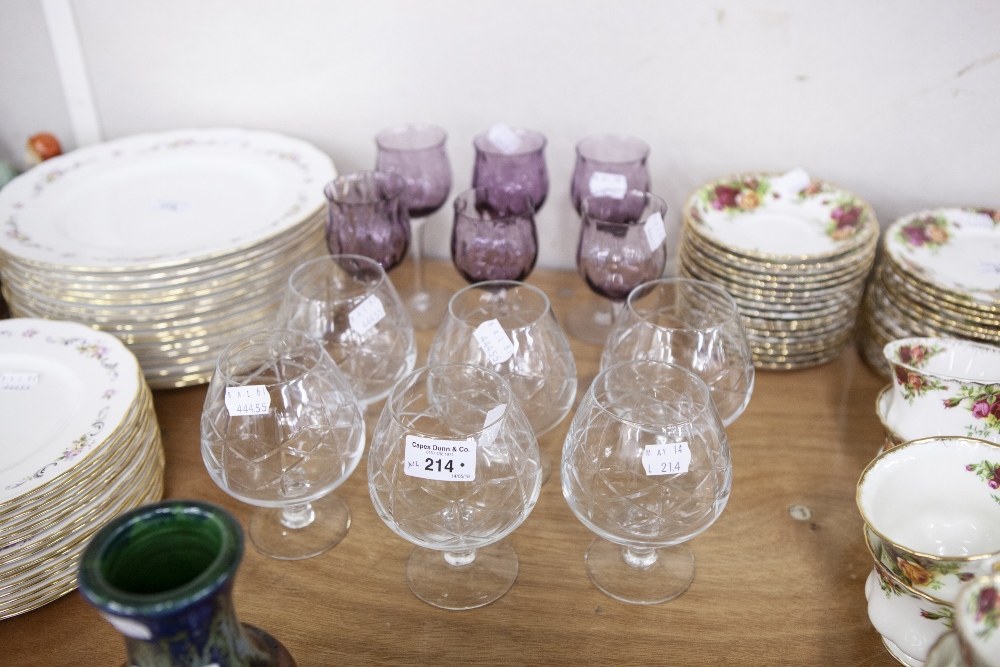 A SET OF SIX ITALIAN LILAC TULIP SHAPE GOBLETS AND SIX CUT GLASS BRANDY BALLOONS (12)