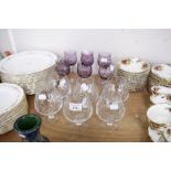 A SET OF SIX ITALIAN LILAC TULIP SHAPE GOBLETS AND SIX CUT GLASS BRANDY BALLOONS (12)