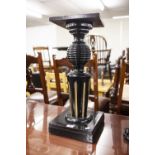AN OLD EBONISED WOOD, LOW TORCHERE WITH SQUARE TOP AND BASE