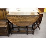 AN INTER-WAR YEARS OAK GATELEG TABLE