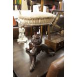 A VICTORIAN HEIGHT ADJUSTABLE MUSIC STOOL