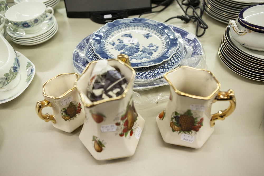 CERAMICS- GRADUATED SET OF THREE STAFFORDSHIRE POTTERY JUGS, FIVE BLUE AND WHITE PLATES AND A MEAT