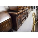 AN EARLY TWENTIETH CENTURY MAHOGANY SIDEBOARD, RAISED BACK, ONE LONG AND TWO SHORT DRAWERS, ONE