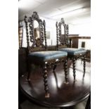 A PAIR OF VICTORIAN CARVED OAK SINGLE CHAIRS WITH BOBBIN TURNED FRAME AND SUPPORTS AND FLORAL