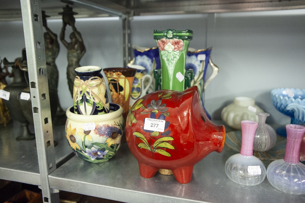 SIX VARIOUS POTTERY VASES, WITH TUBE LINED DECORATION AND A SIMILAR PLANT POT AND A LARGE GERMAN RED