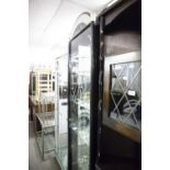 A MODERN BLACK LACQUERED CORNER DISPLAY CABINET WITH MIRRORED GLAZED ARCHED PEDIMENT, CUT GLASS FULL