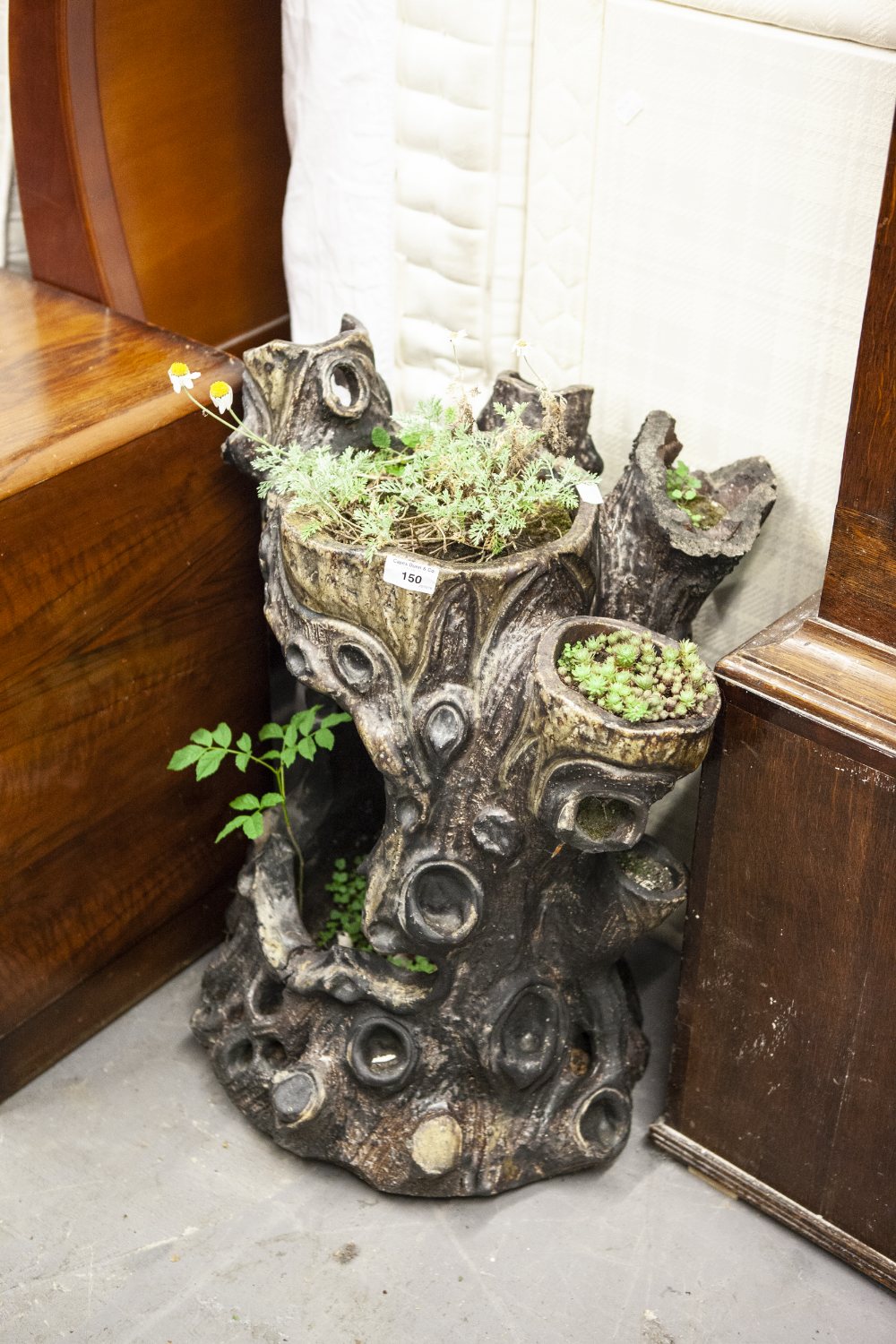 A POTTERY TREE FORM PLANTER (A.F.)