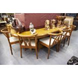 A LARGE LIGHTWOOD BOARDROOM TABLE ON TWO PEDESTALS, TEN MATCHING CHAIRS WITH CURVED BACKS, AND A