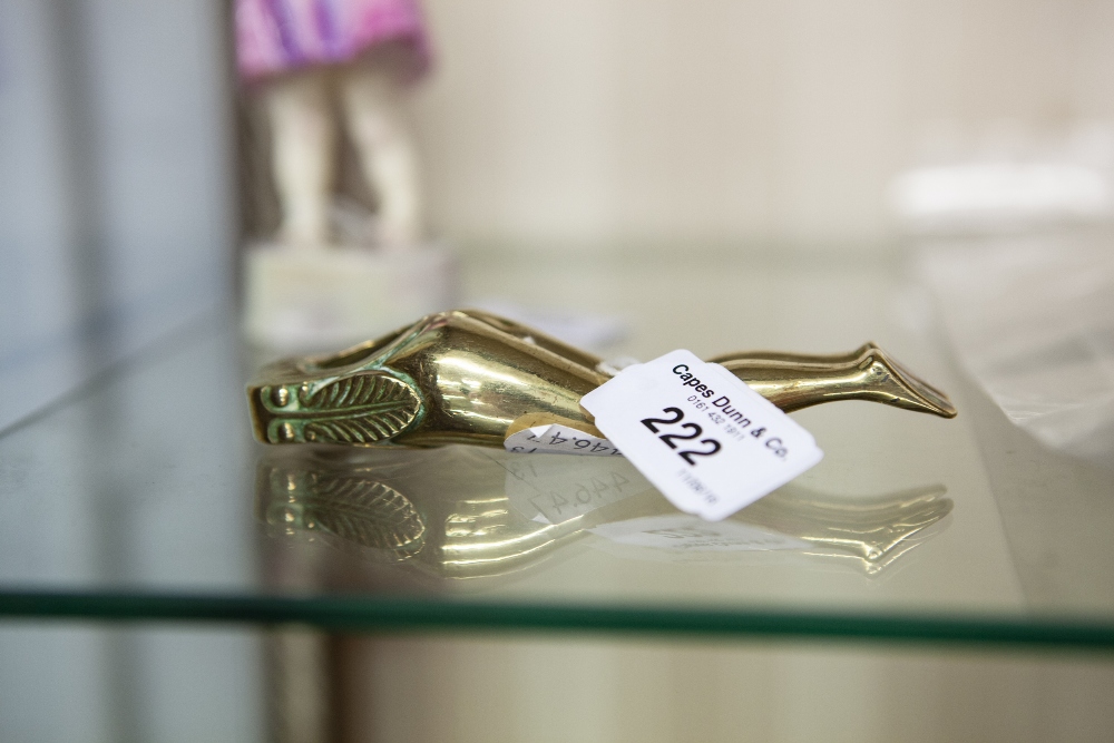 AN EARLY TWENTIETH CENTURY NOVELTY BRASS NUT CRACKERS IN THE FORM OF LADIES LEGS