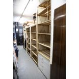 FOUR WOODEN SHELVING UNITS WITH FABRIC FALLS AND A SMALLER UNIT AND A CHEST OF FOUR DRAWERS