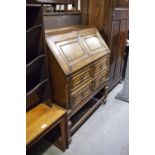 JACOBEAN STYLE GOOD QUALITY BUREAU WITH SLOPING FALL FRONT, TWO SHORT AND TWO LONG DRAWERS, ON