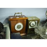 A MODERN BRASS MANTEL CLOCK AND ANOTHER IN OAK CASE