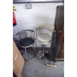 A BRIGHT METAL TUBULAR FRAMED REVOLVING KITCHEN ARMCHAIR, WITH CREAM VINYL BACK AND CIRCULAR SEAT;