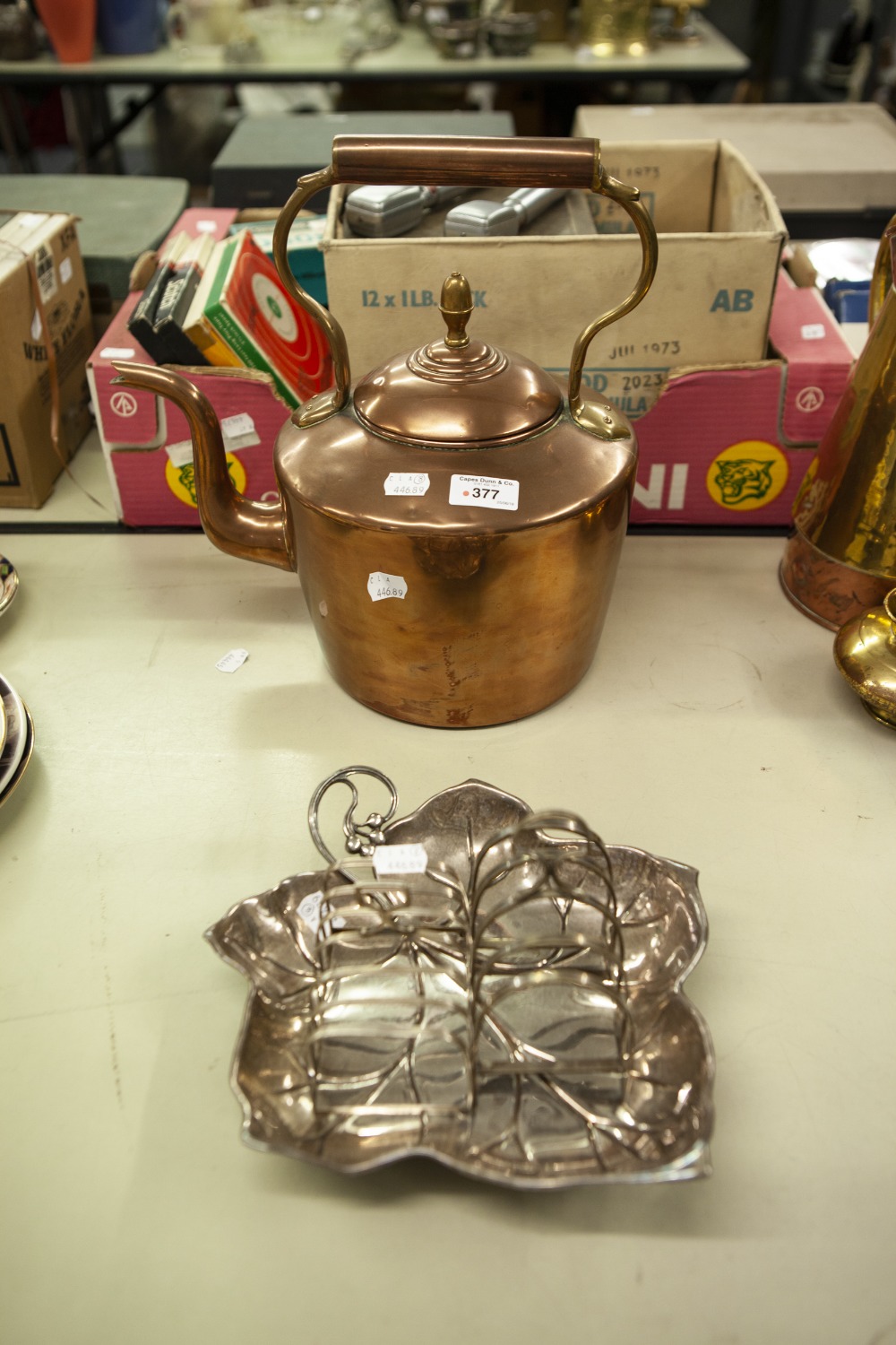 AN ANTIQUE COPPER KETTLE, A SILVER TOAST RACK, AN EP TOAST RACK AND AN EP. LEAF SHAPED BON BON DISH